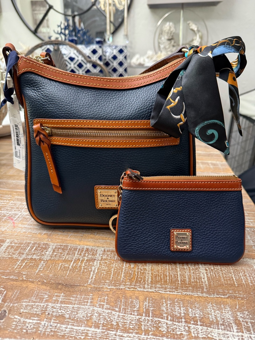 Dooney & Bourke Pebble Grain Crossbody Marine Blue  9” x 10 1/2” , card holder.